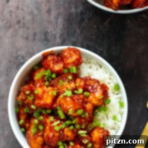 gochujang cauliflower wings in bowls with rice and green onions