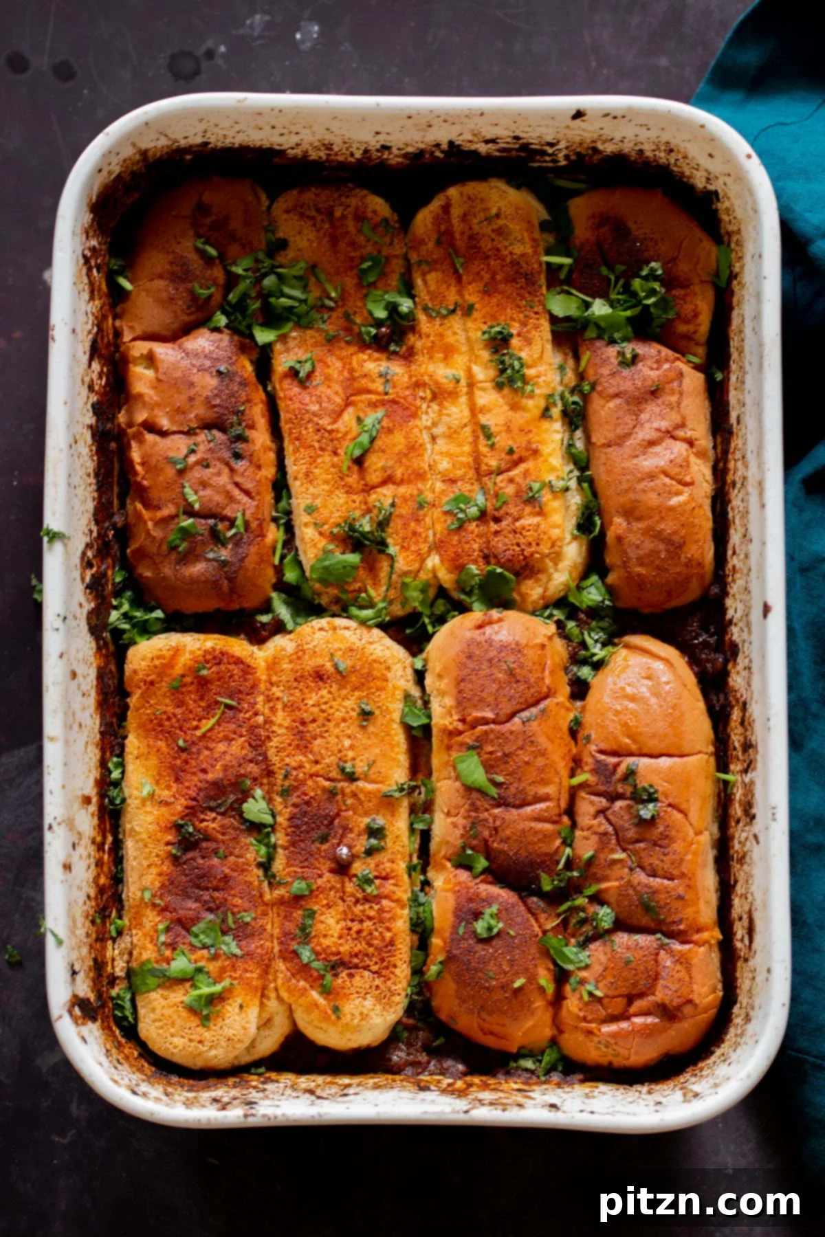 Vegan Lentil Keema Pav Bake 2 Lentil Keema Pav Casserole in the baking pan after baking