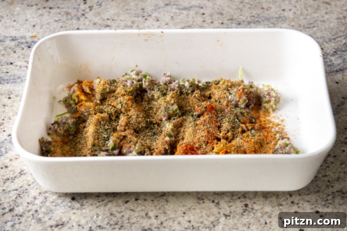 Vegan Lentil Keema Pav Bake 11 ground spices added to the chopped aromatics in the pan before baking