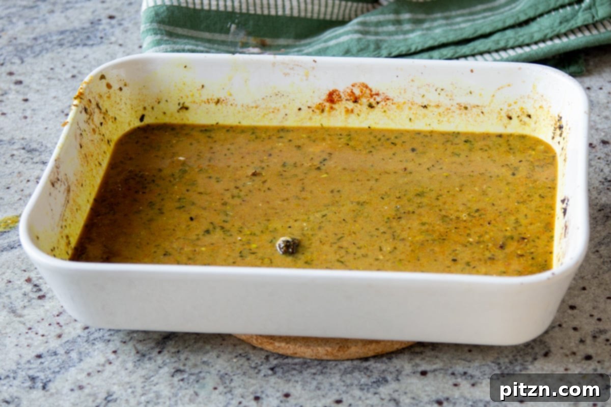 Vegan Lentil Keema Pav Bake 14 baking pan after adding the liquids and stirring in the other ingredients