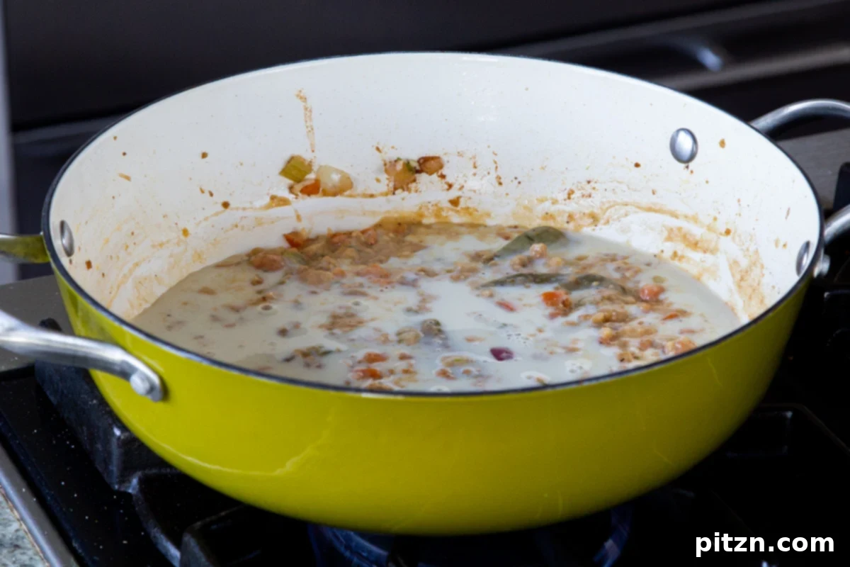 Fireside Smoked Potato Soup 13 Toasted flour perfectly dissolved into the nondairy milk, creating a smooth, lump-free base for the soup in the pan