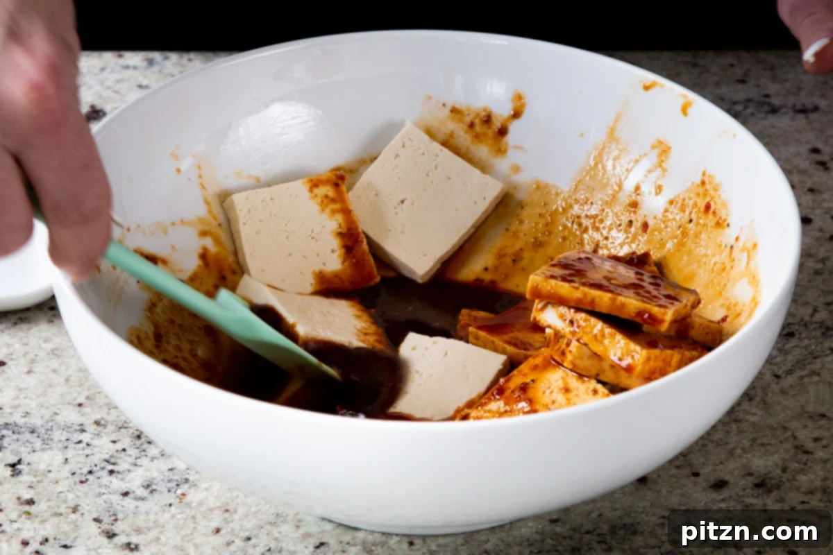 Spicy Gochujang Tofu Sandwich 9 Tofu added to the gochujang marinade, before mixing.