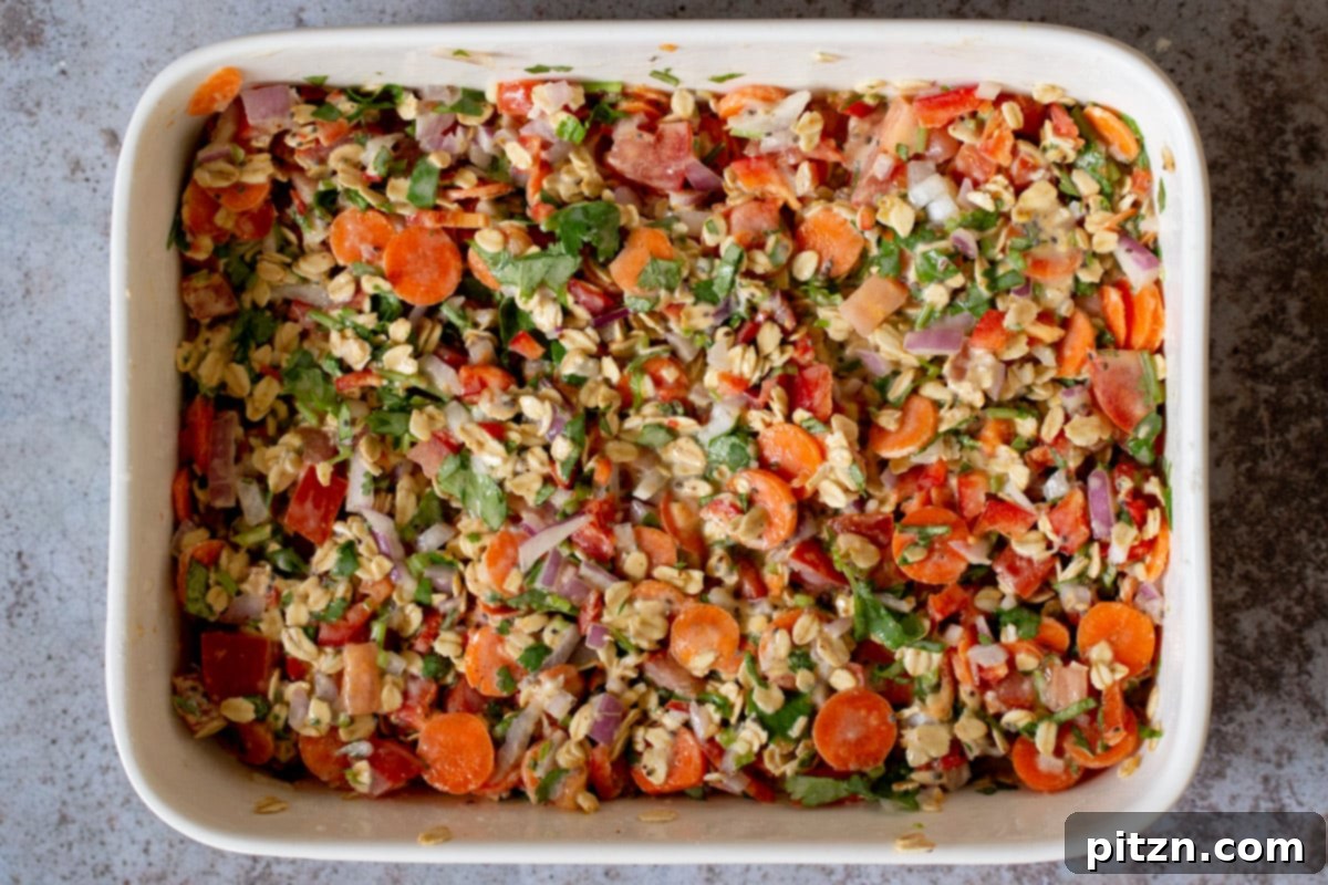 Vegan Savory Vegetable Baked Oats 10 the savory baked oats mixture, perfectly combined and smoothed out in the pan, ready for baking