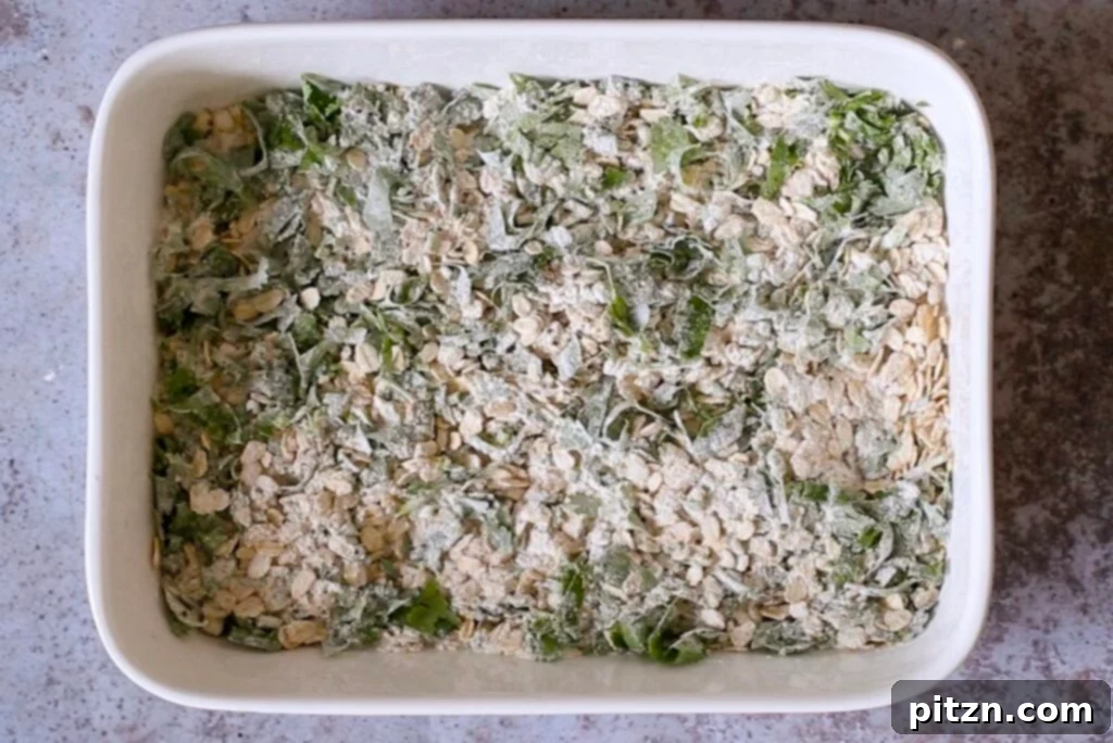 Vegan Savory Vegetable Baked Oats 8 oats, flour, seeds, and cilantro are perfectly mixed and ready in the baking pan