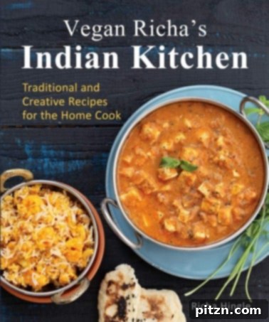 Meet Richa 4 Cover of Vegan Richa's Indian Kitchen cookbook, showcasing vibrant Indian dishes