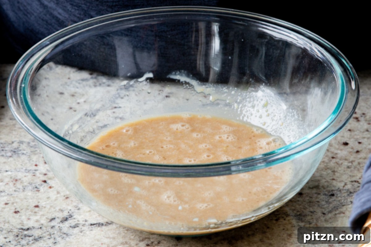 Decadent Carrot Halwa Gateau 19 The wet cake ingredients after thorough mixing, forming a cohesive liquid base.