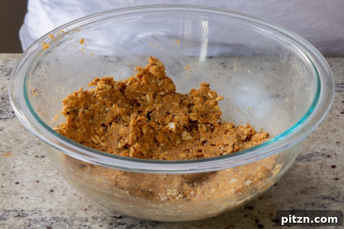 Doritos Nacho Crunch Bars 11 The savory granola bar dough in the bowl after thorough mixing