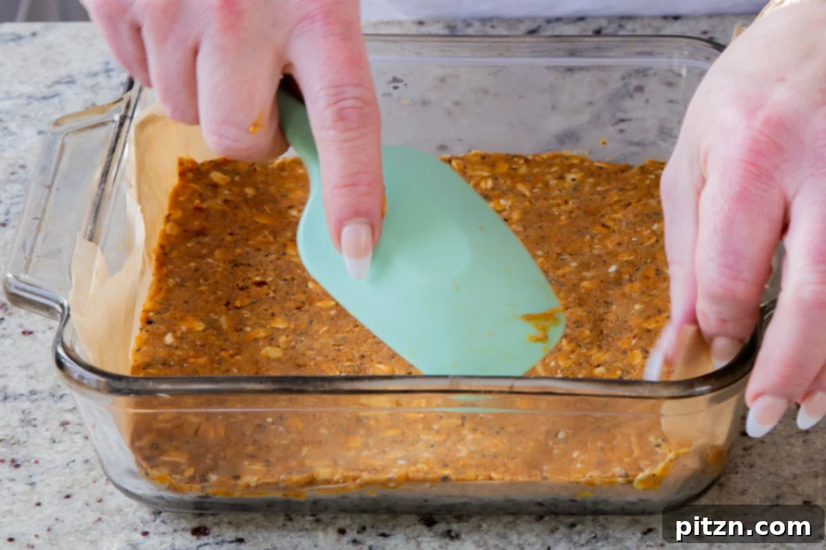 Doritos Nacho Crunch Bars 13 Pressing the savory granola bar dough firmly into the lined baking pan