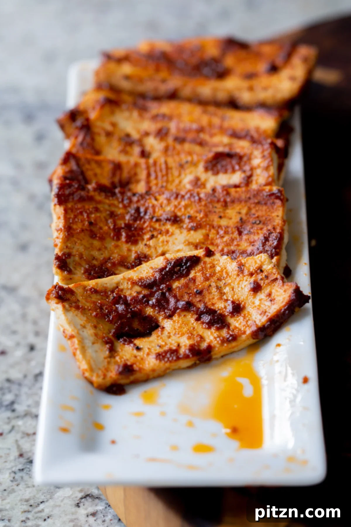 Plant-Based Deli Club 3 Perfectly baked tofu deli slices, golden brown and ready for your vegan club sandwich.