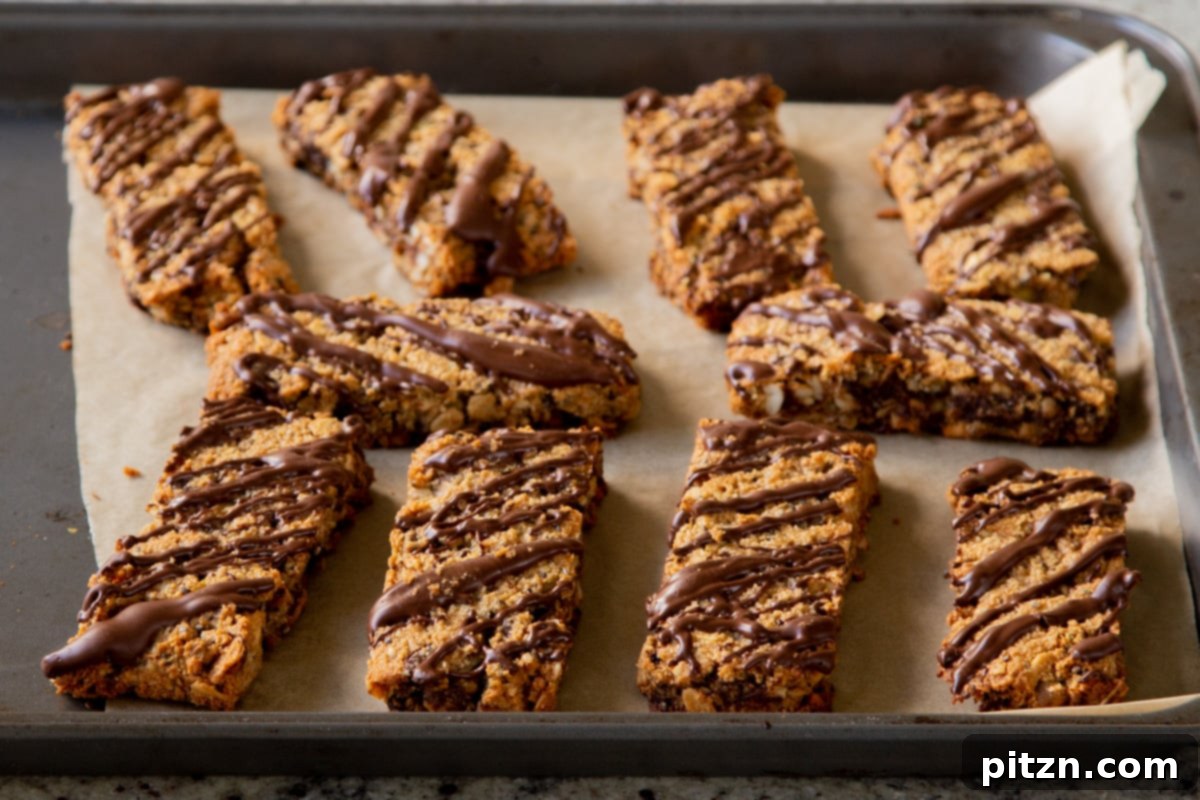 Perfectly Crisp Granola Bars 19 re-baked crunchy granola bars on the baking sheet