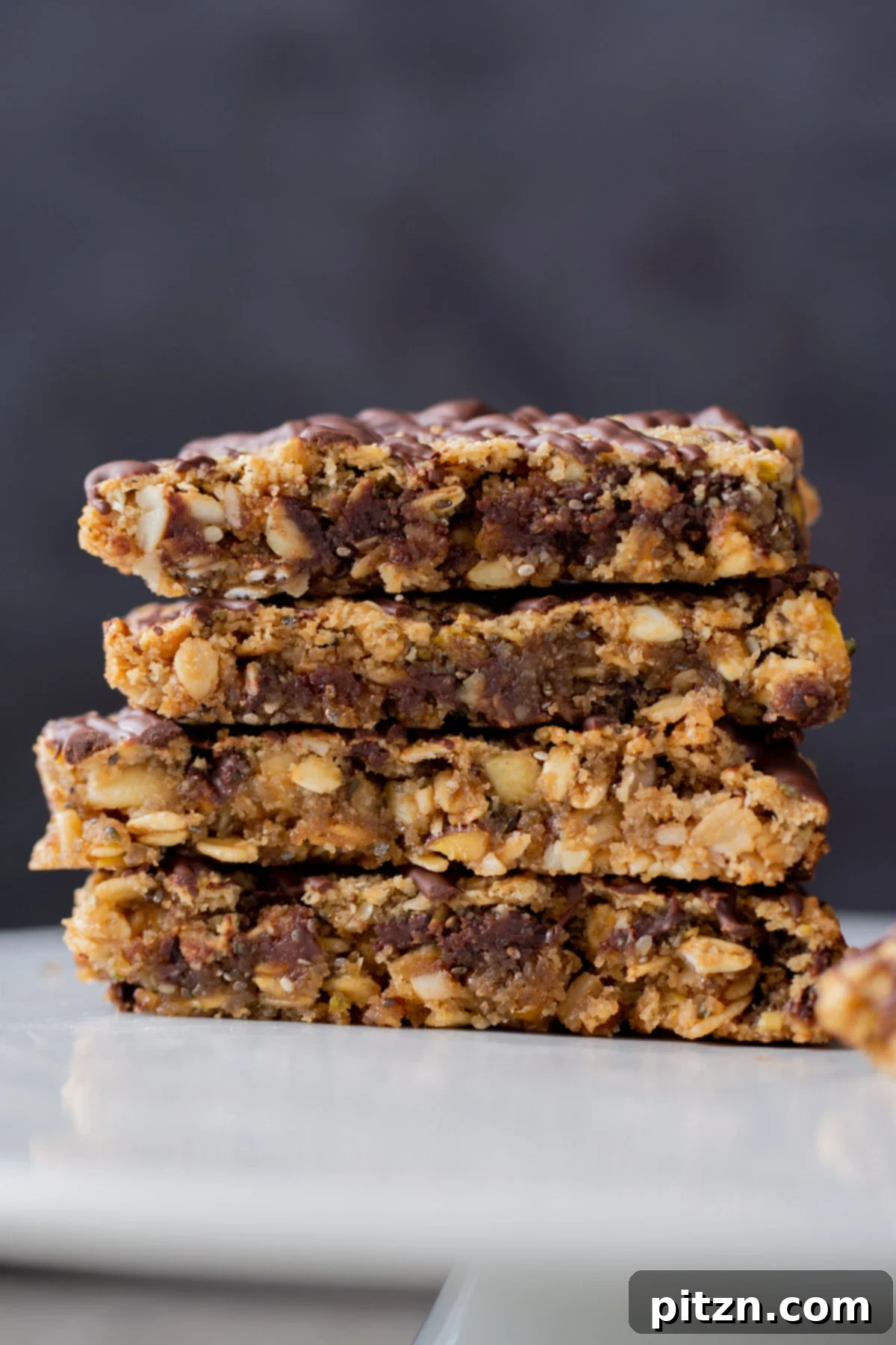 Perfectly Crisp Granola Bars 4 stack of crunchy granola bars, side shot, so you can see the texture inside