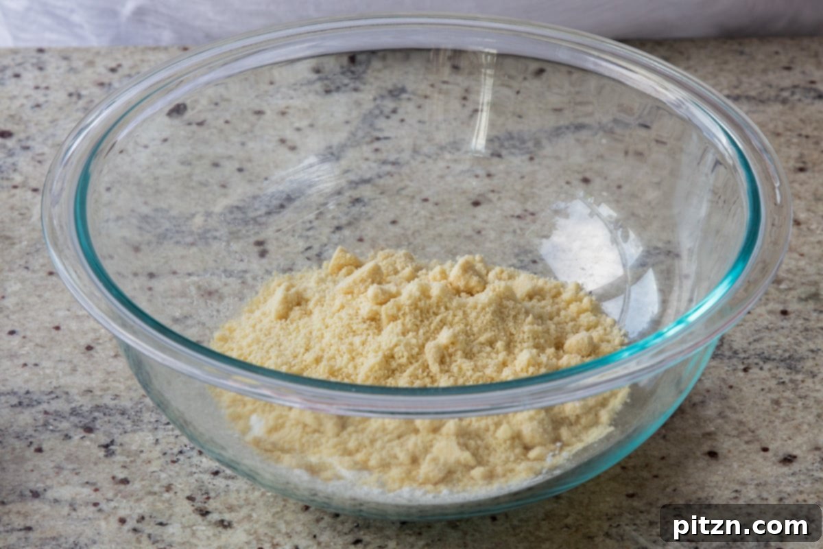 Perfectly Crisp Granola Bars 7 almond flour in a mixing bowl