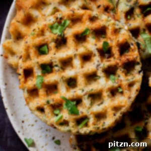 Close-up of Rava Idli Waffles on a plate, ready to be served with chutney.