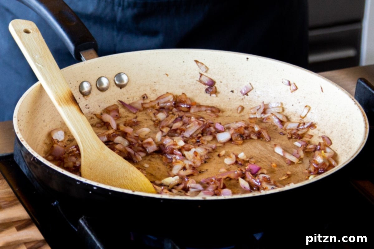 North Indian Restaurant Bhuna: A Vegetarian Curry Classic 10 golden brown, caramelized onion in the pan after cooking