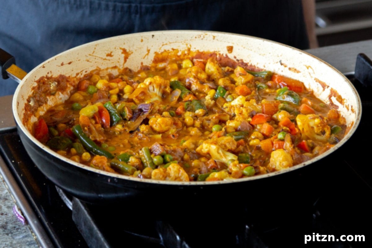 North Indian Restaurant Bhuna: A Vegetarian Curry Classic 19 finished vegetable bhuna in the pan, after mixing in the topping and garnished with cilantro