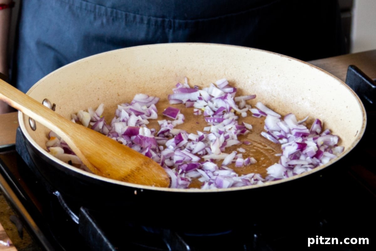 North Indian Restaurant Bhuna: A Vegetarian Curry Classic 9 chopped red onion in the pan before cooking