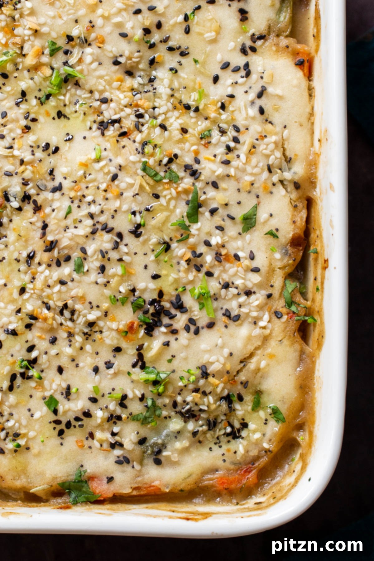 Everything Bagel Pot Pie Remix 3 Close-up of the pan of everything bagel pot pie, perfectly baked with a golden crust