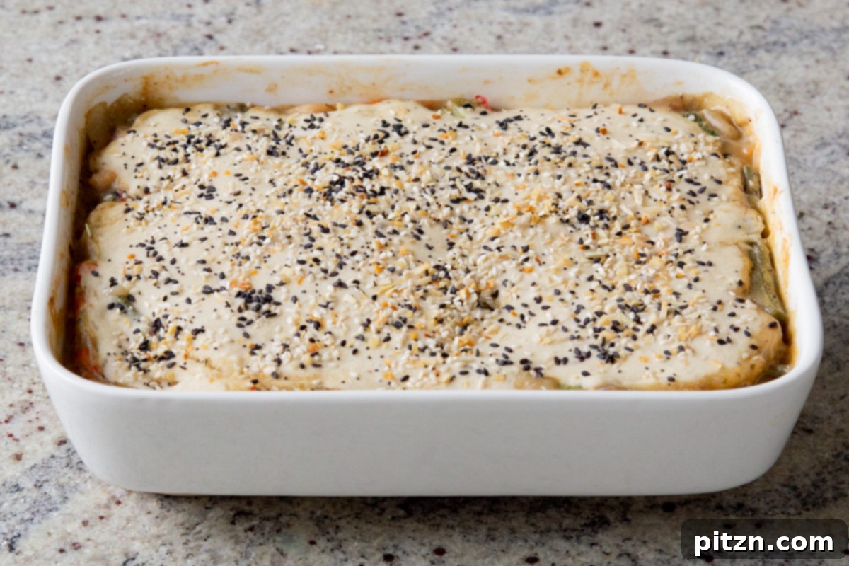 Everything Bagel Pot Pie Remix 21 Sprinkling additional everything bagel seasoning on top of the biscuit dough before baking for extra flavor and texture