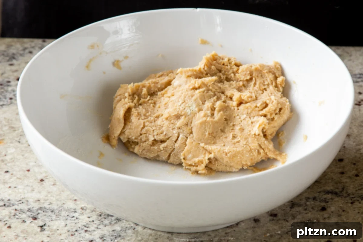 dough for mango bars in the bowl, after mixing