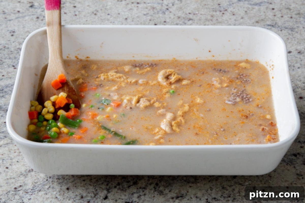 Sheet Pan Konkani Lentil Curry 15 adding water to the pan
