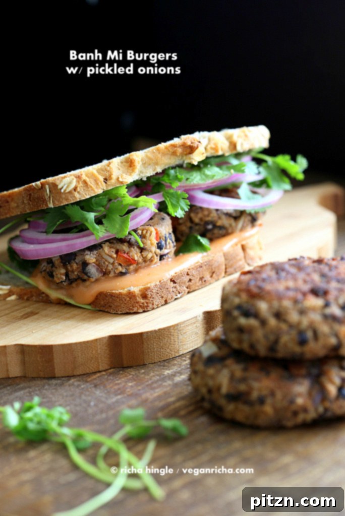 Everyday Vegan Eats Cookbook Reviewed Vegan Pad Thai Put To The Test 3 Hearty Vegan Banh Mi Burger made with black beans, rice, and aromatic Asian spices, served with a zesty sriracha mayo and quick-pickled vegetables like onions, carrots, and red peppers. A satisfying plant-based sandwich or burger option.