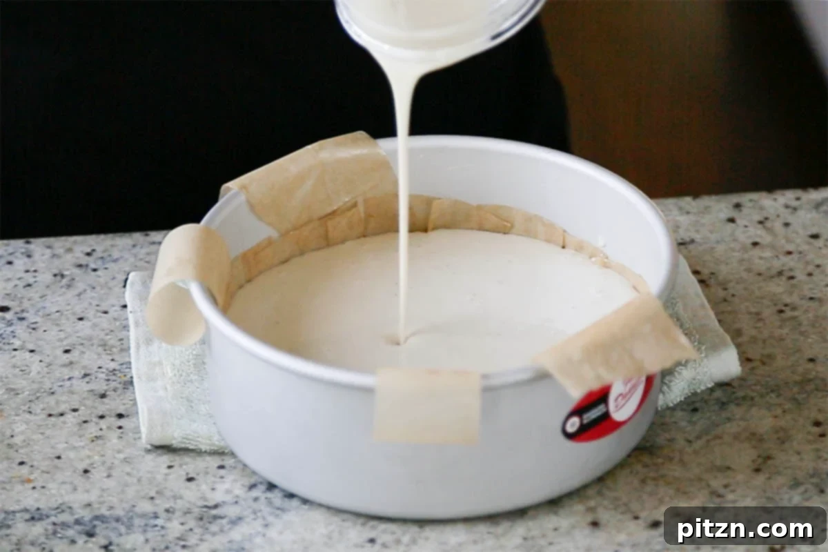 Indian Fusion Grain Free No Bake Carrot Halwa Cheesecake 15 pouring cheesecake mixture into the pan