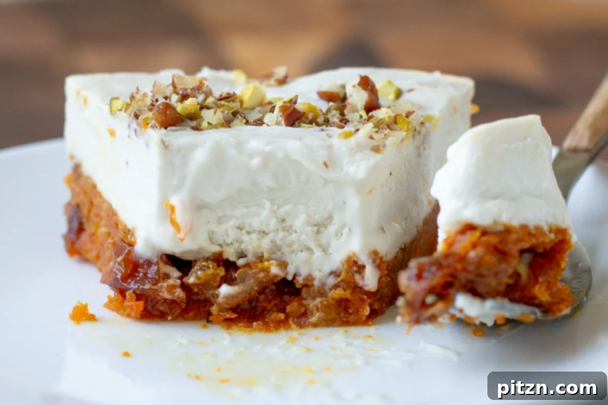 Indian Fusion Grain Free No Bake Carrot Halwa Cheesecake 18 slice of carrot cake cheesecake with a bite taken out