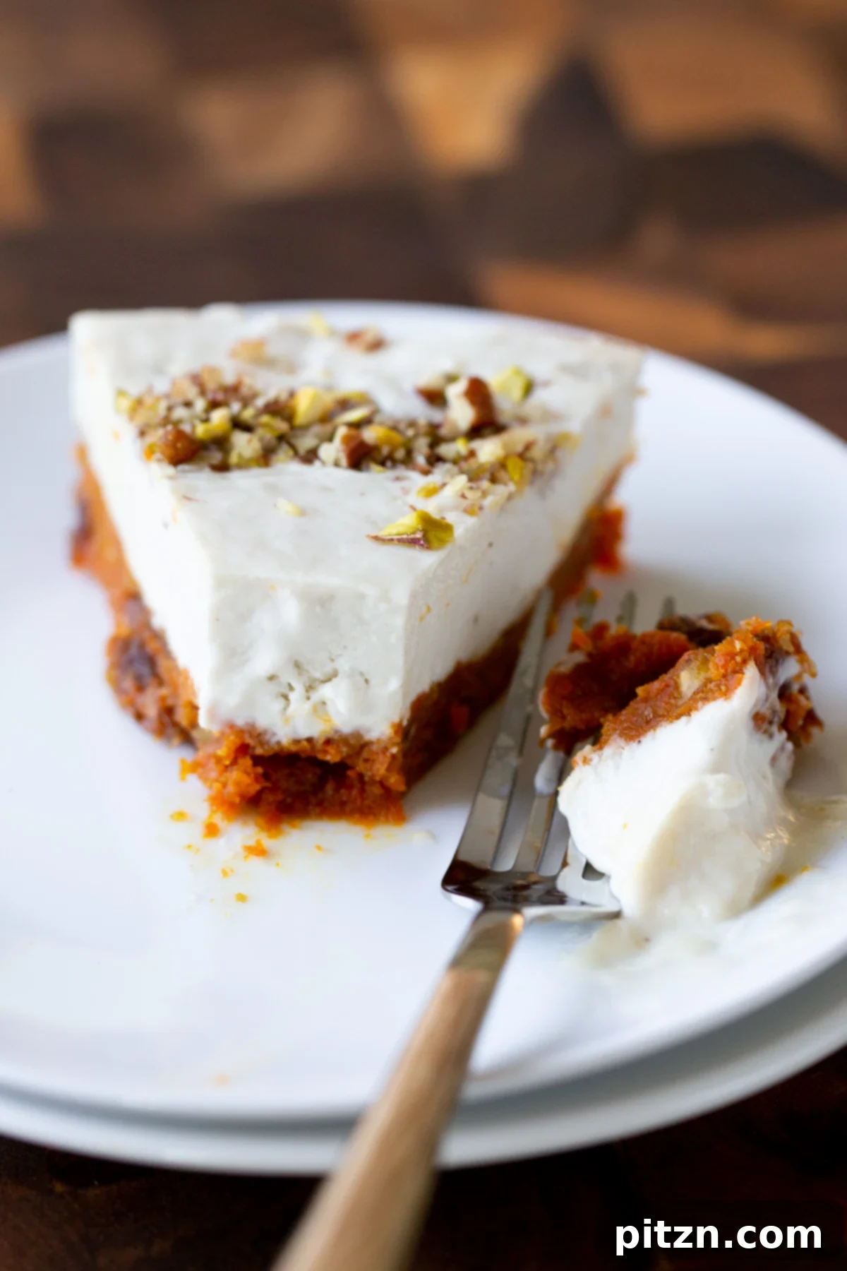 Indian Fusion Grain Free No Bake Carrot Halwa Cheesecake 4 slice of carrot halwa cheesecake with a bite taken out