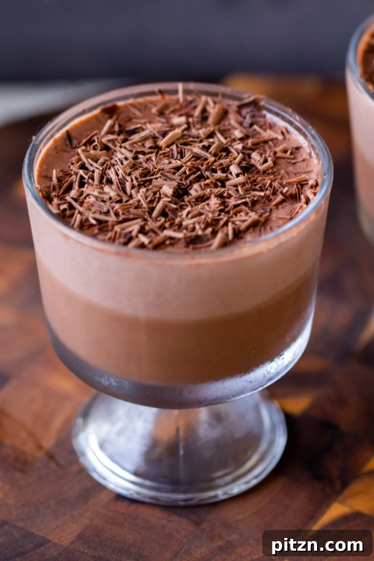 Decadent Easy Vegan Chocolate Pudding Soy Gluten Nut Free 2 Cup of two-layer vegan chocolate pudding with chocolate shavings on top