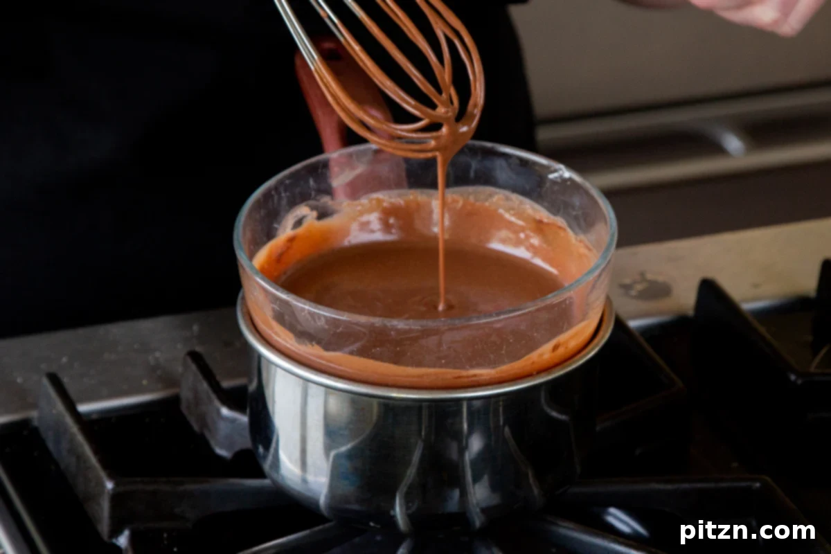 Decadent Easy Vegan Chocolate Pudding Soy Gluten Nut Free 11 Gently warming the mousse-chocolate mixture in a double boiler to ensure a smooth blend.