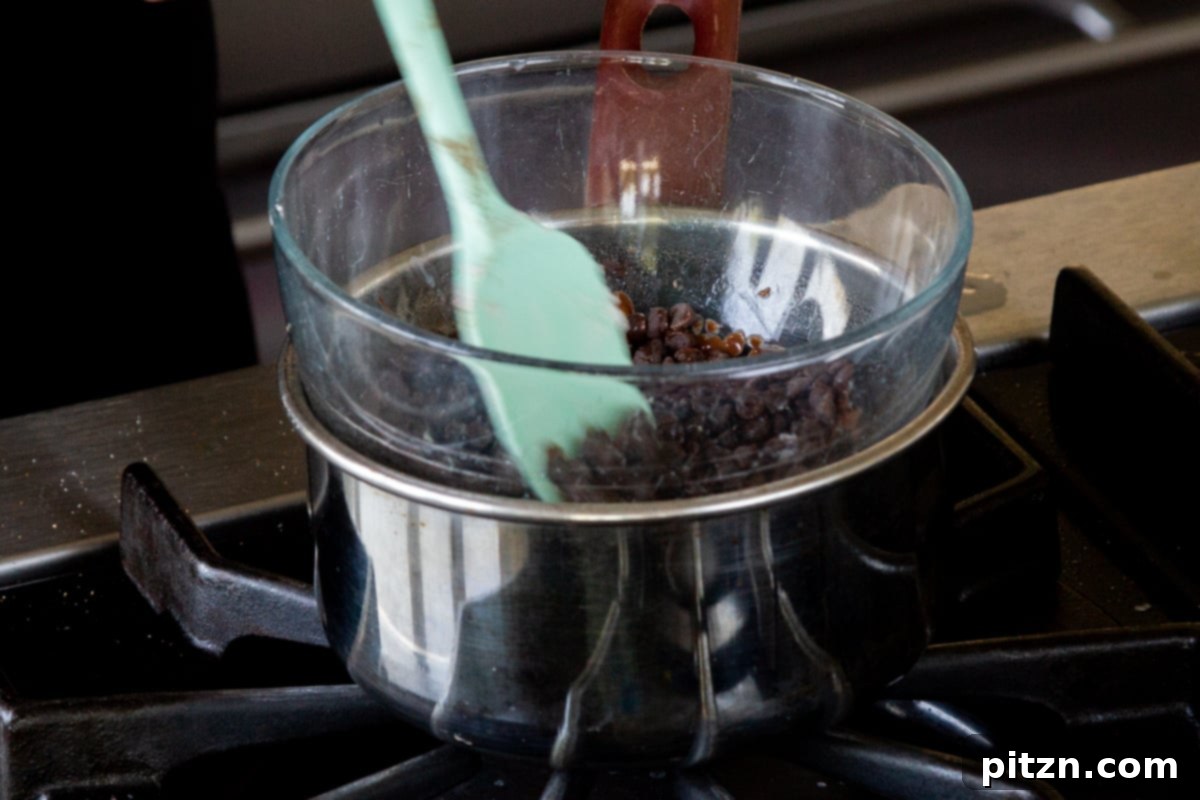 Decadent Easy Vegan Chocolate Pudding Soy Gluten Nut Free 8 Melting vegan chocolate chips in a double boiler for the darker pudding layer.