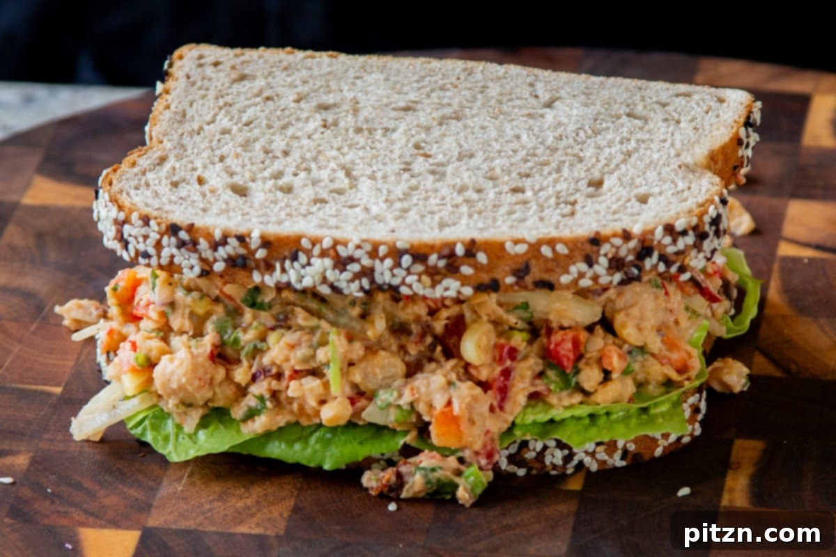cajun chickpea salad in a sandwich with lettuce