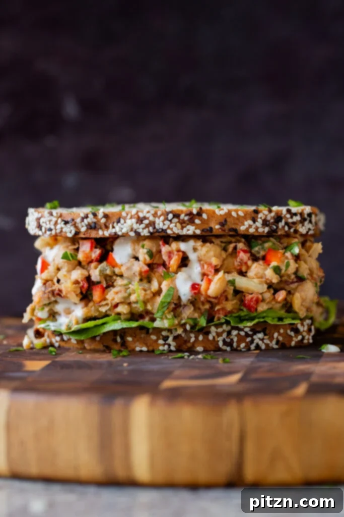 cajun chickpea salad in a sandwich with lettuce