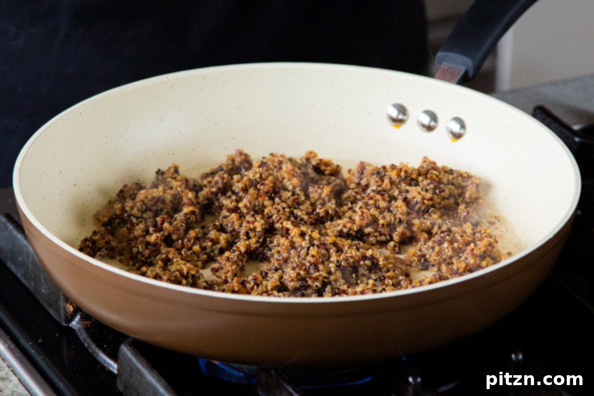 Crispy Quinoa Tacos: Effortlessly Allergy-Friendly 10 Adding the cooked quinoa taco meat to a hot frying pan with oil to begin the crisping process