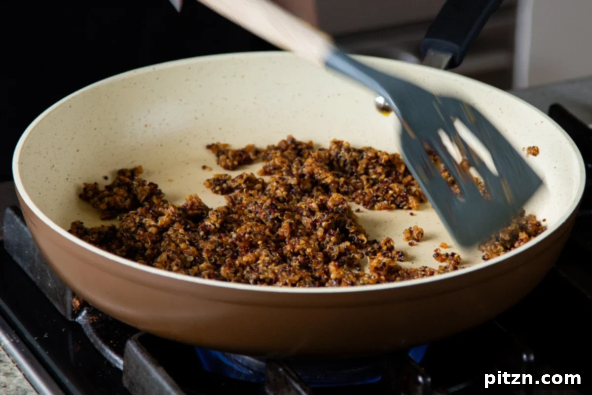 Crispy Quinoa Tacos: Effortlessly Allergy-Friendly 11 Quinoa taco meat in the pan, after crisping on the stovetop, showing its golden and crunchy texture
