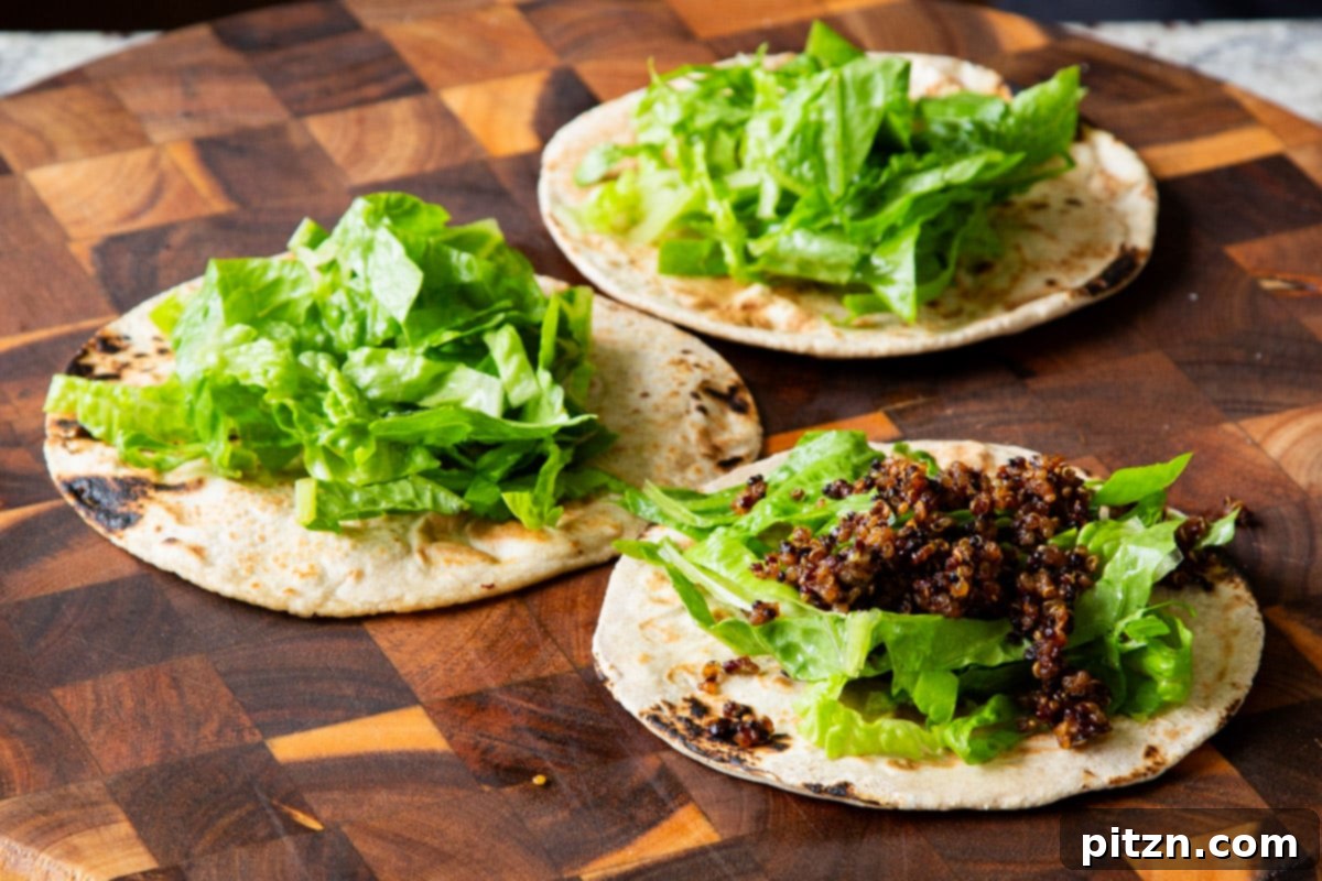 Crispy Quinoa Tacos: Effortlessly Allergy-Friendly 16 Adding fresh chopped lettuce to warm tortillas as the base for the crispy quinoa tacos