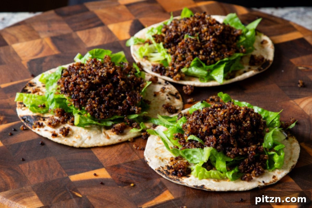 Crispy Quinoa Tacos: Effortlessly Allergy-Friendly 17 Adding a generous portion of crispy quinoa taco meat onto tortillas topped with lettuce