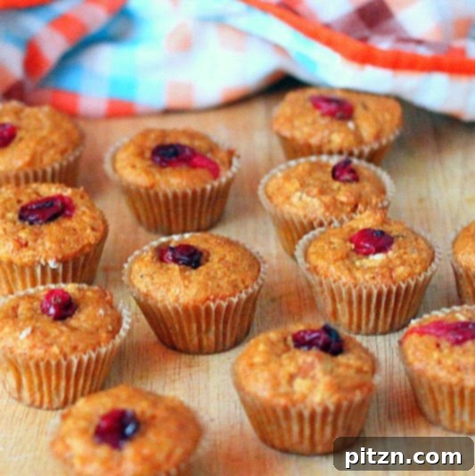 Vegan Carrot Cake Muffins and Halwa Delights 4 A plate of golden-brown vegan carrot almond muffins with a hint of spice, ready to be enjoyed.