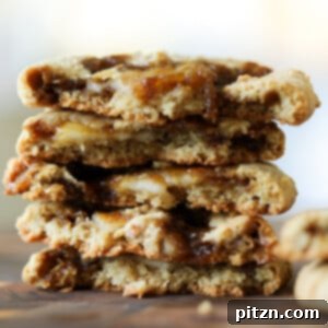 stack of halved tiramisu cookies, so you can see inside them