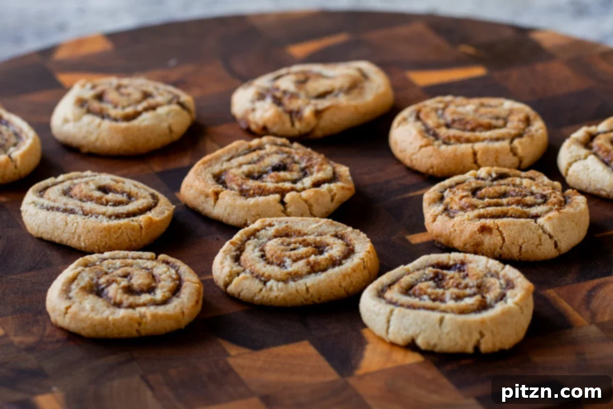 pumpkin spice roll cookies on a wooden tray, ready for serving