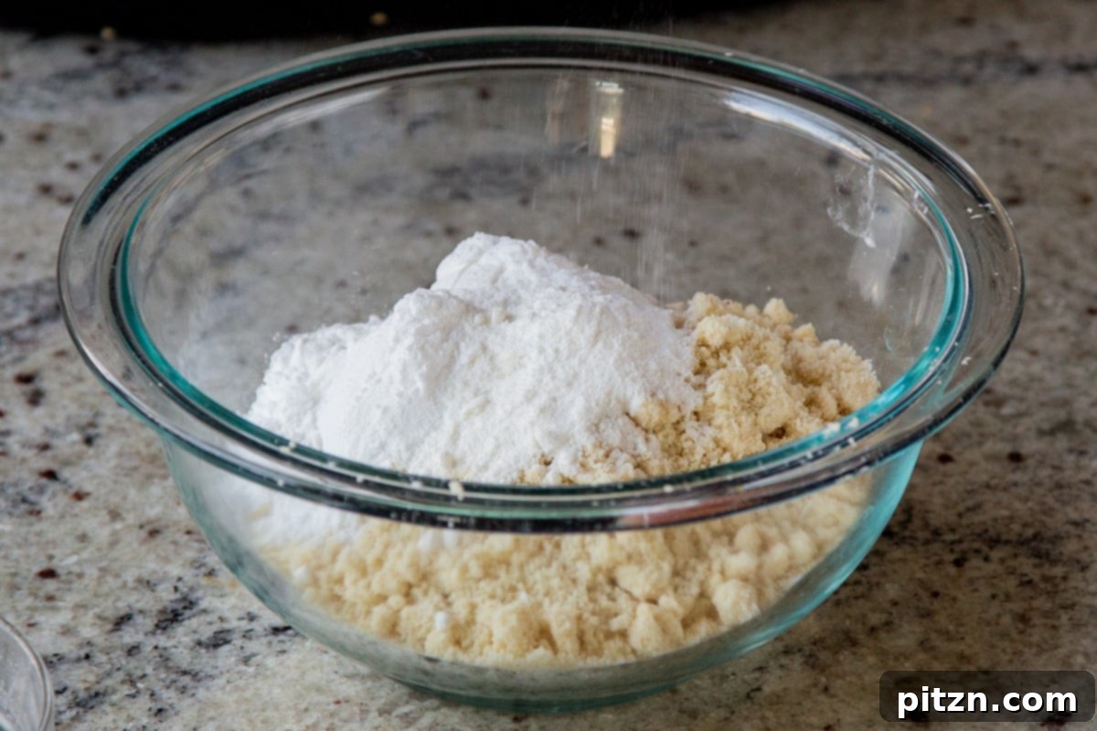 dry ingredients in a mixing bowl for gluten-free pumpkin spice roll cookies