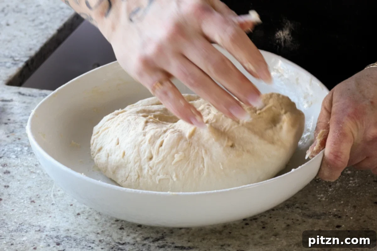 Melt-in-Your-Mouth Dinner Rolls 15 kneading the dough