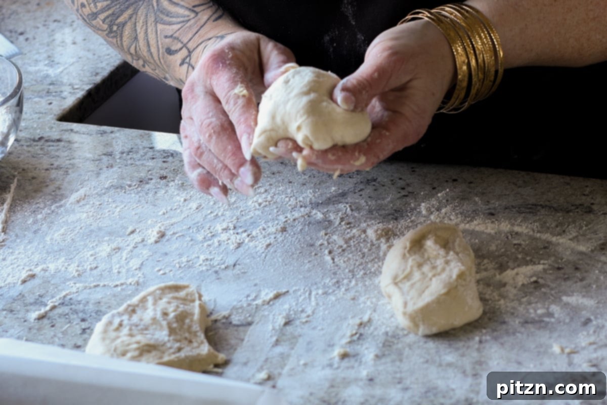 Melt-in-Your-Mouth Dinner Rolls 23 shaping the dinner rolls