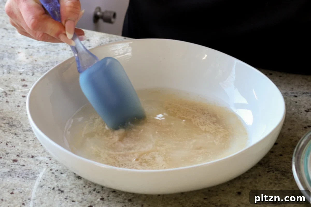 Melt-in-Your-Mouth Dinner Rolls 8 stirring sugar and yeast into the water