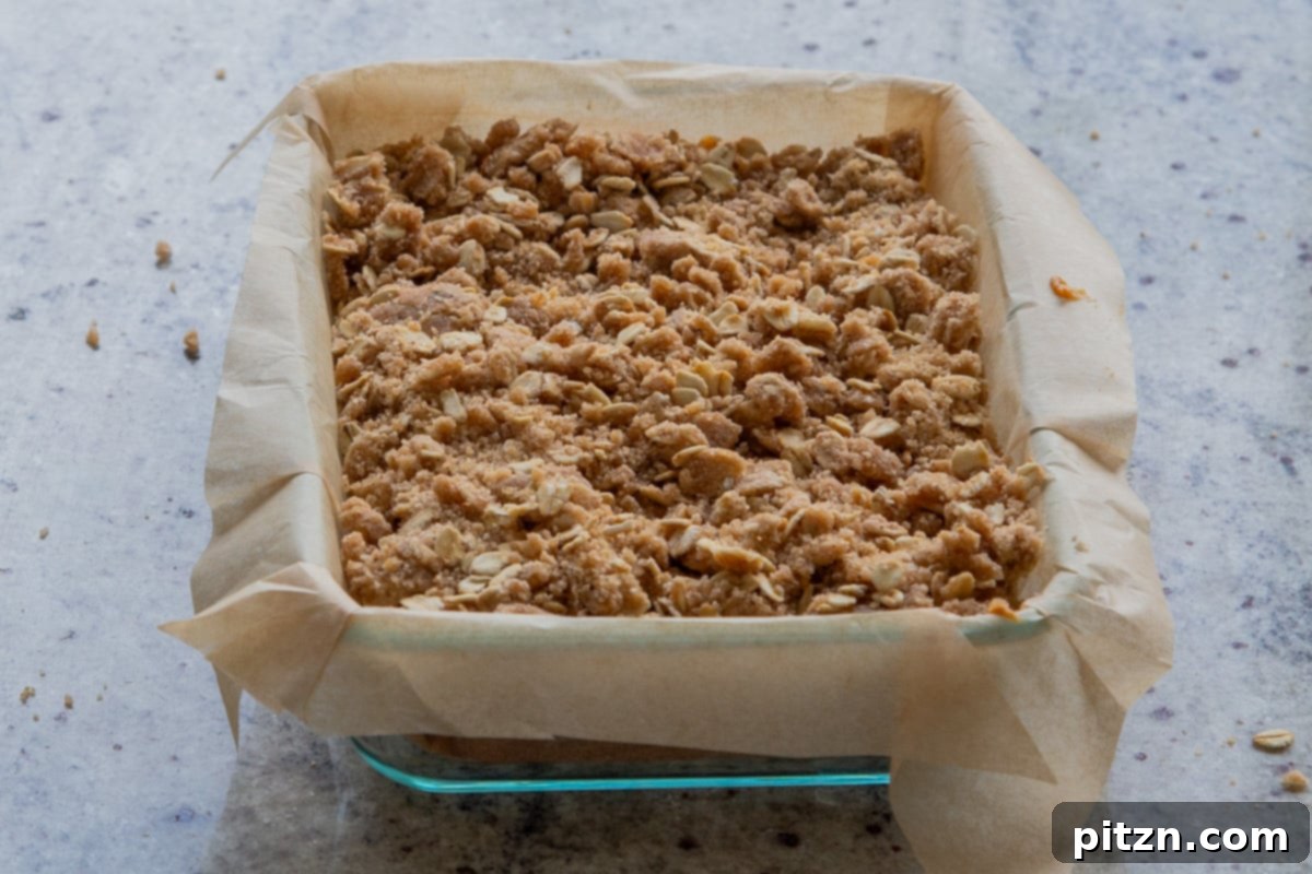 crumb topping on top of the pumpkin crisp, before baking