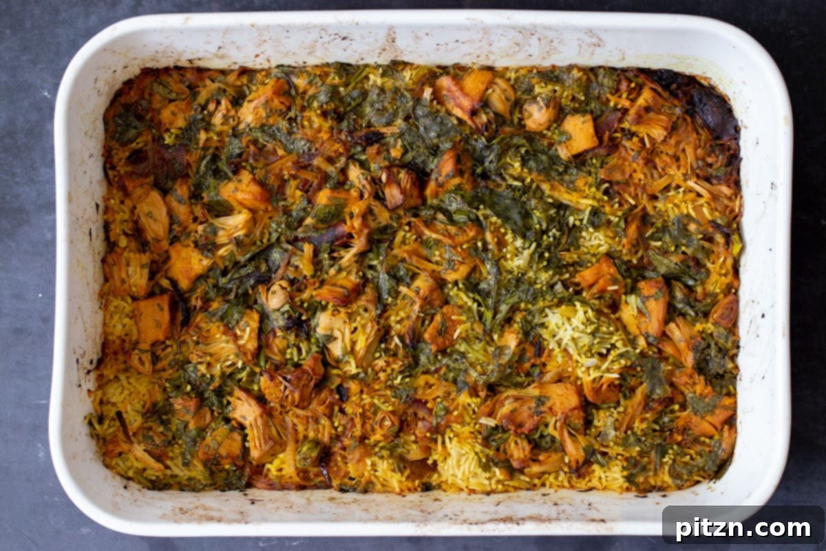 The baked jackfruit biryani, just out of the oven and still covered, before being fluffed.