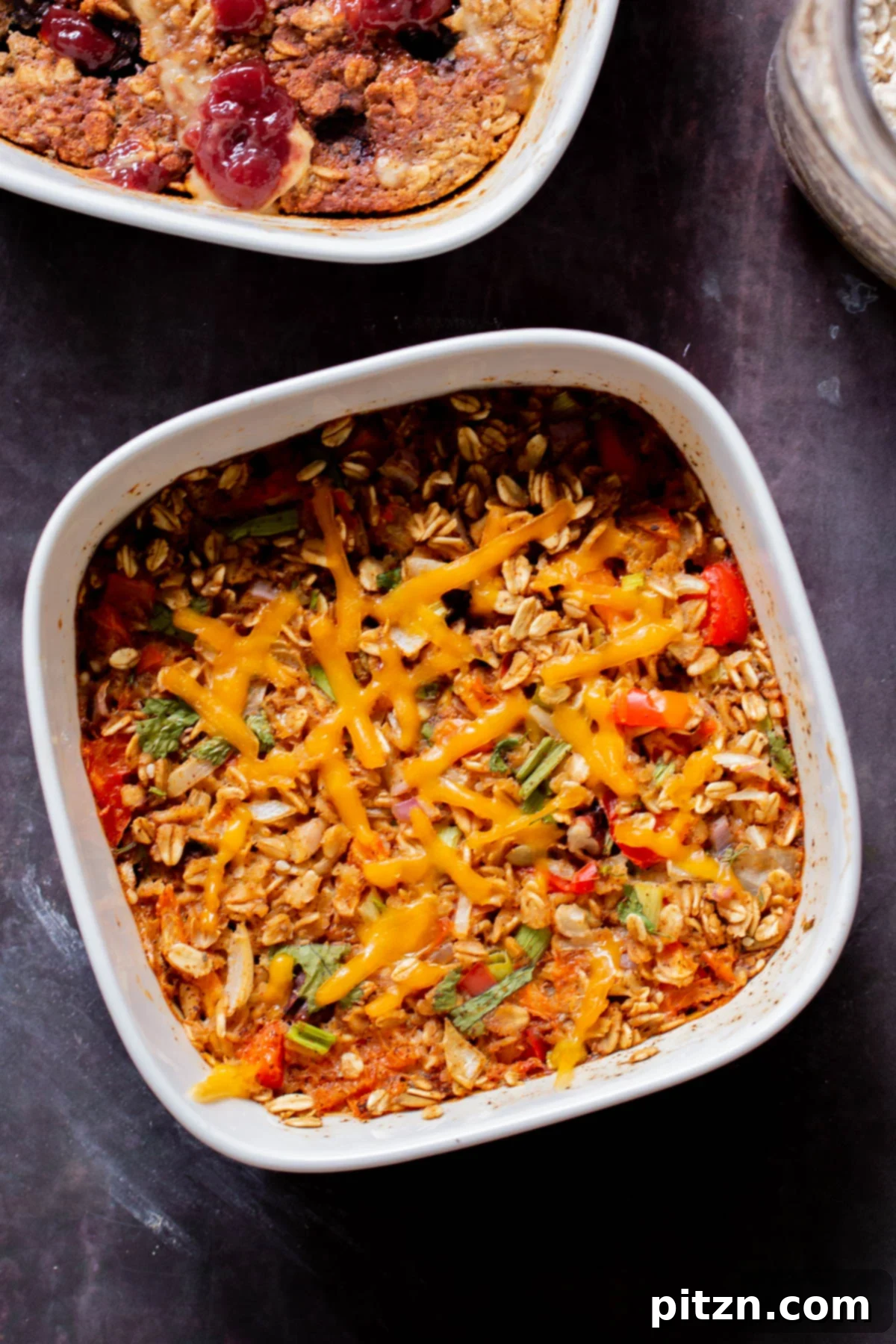 Cozy Baked Oatmeal Gift Mix 4 Savory Tex-Mex baked oatmeal in a baking pan, garnished with herbs or cheese, showcasing its appealing texture and vibrant spices.