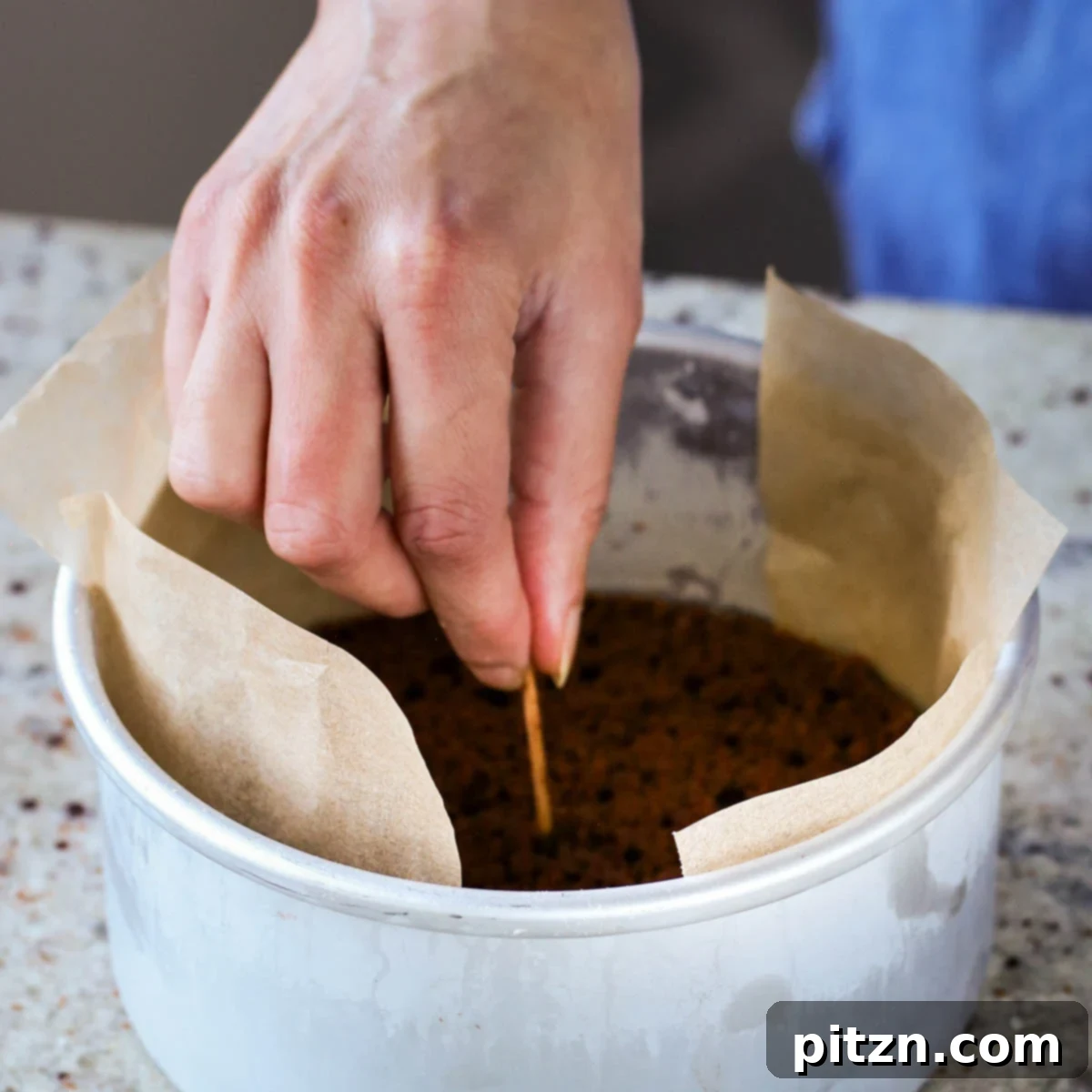 Decadent Vegan Mocha Cake with Velvety Chocolate Mousse (Gluten-Free Option) 18 poking holes in the cake with a toothpick