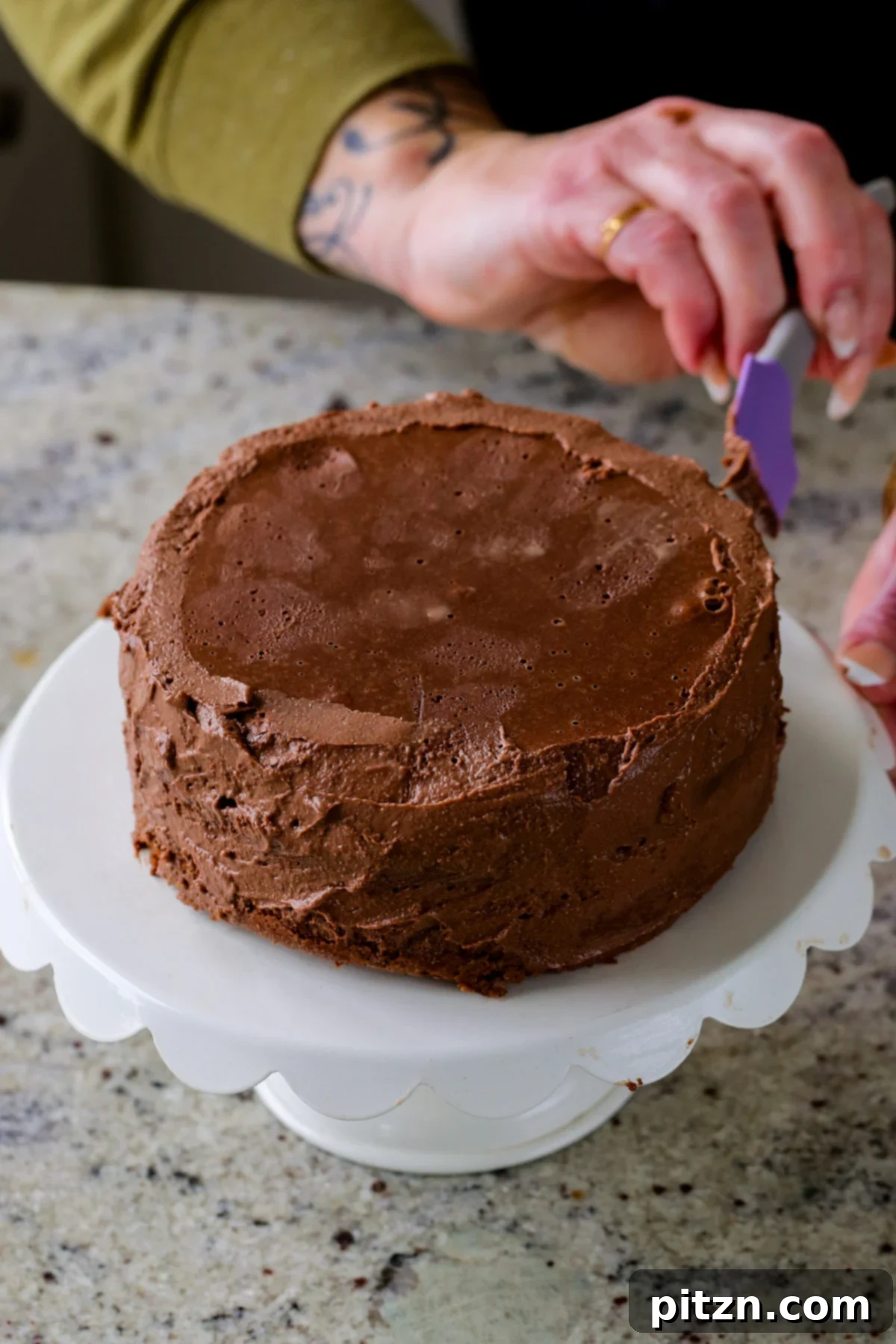 Decadent Vegan Mocha Cake with Velvety Chocolate Mousse (Gluten-Free Option) 3 spreading the mocha mousse all over the cake