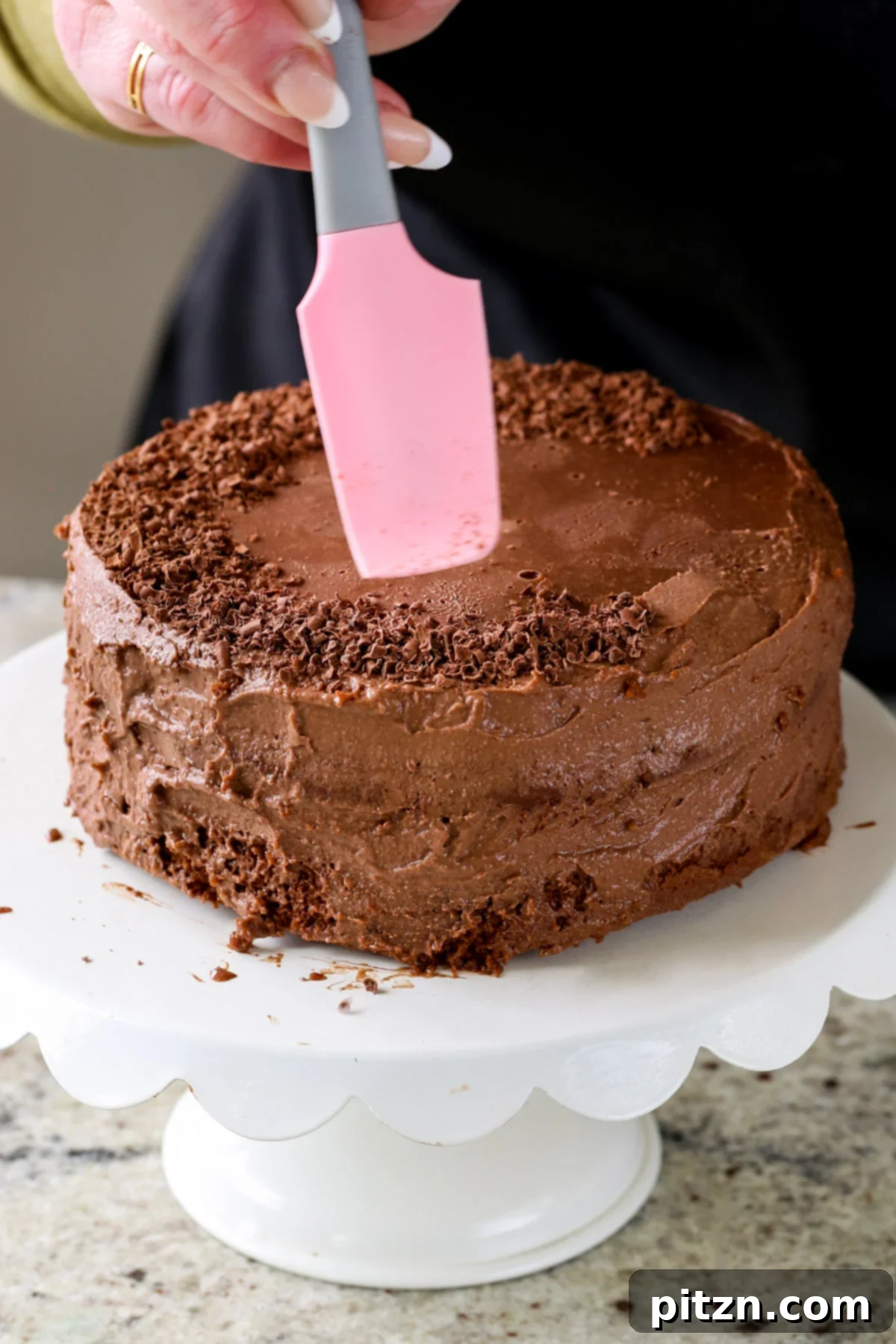 Decadent Vegan Mocha Cake with Velvety Chocolate Mousse (Gluten-Free Option) 4 adding chocolate shavings to the vegan mocha layer cake